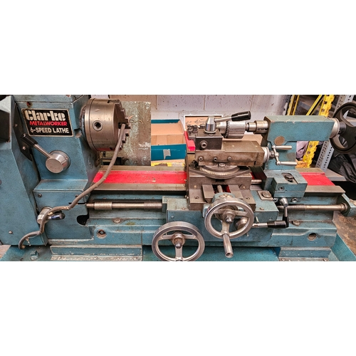 141 - A Clarke 12 speed milling/drilling/lathe with accessories and drills