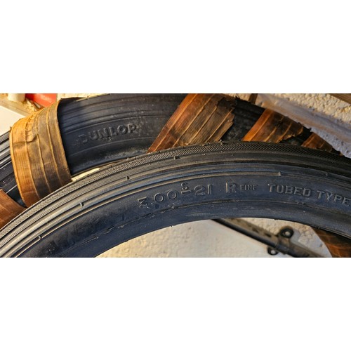 193 - A 300 x 20 tyre and a 300 x 21 tyre