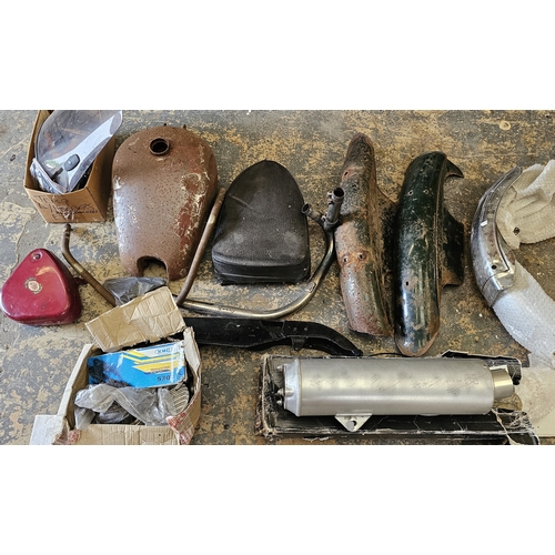 244 - An autojumblers lot to include a pair of leg guards and a pair of veteran handle bars