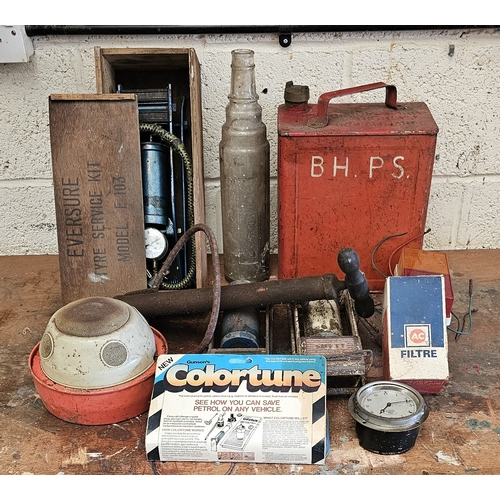 297 - A collection of automobilia to include an Smiths dashboard clock and an ESSOLUBE 1 quart bottle