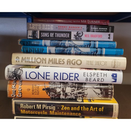 16 - A collection of motorcycle related hardback and paperback books, titles to include 'A Million Miles ... 