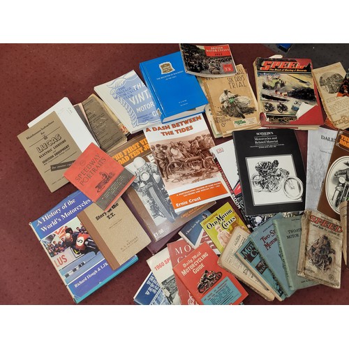 23 - A collection of motorcycle related hardback and paperback books, to include G.S Davison 'The Story O... 