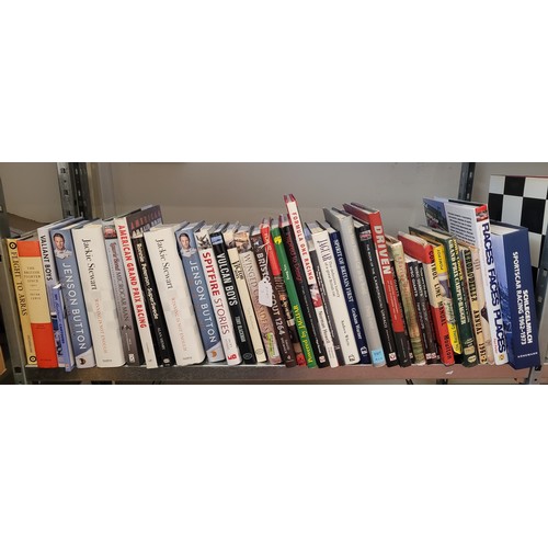 30 - A collection of motorsport books to include titles such as Jaguar, Jenson Button and Jackie Stewart