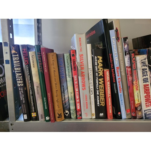 31 - A collection of motorsport books to include titles such as Trailblazers, The Grand Prix and Hawkeye