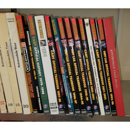 36 - A collection of motorsport books to include titles such as Official Yearbooks 2001-2003, Official Ye... 