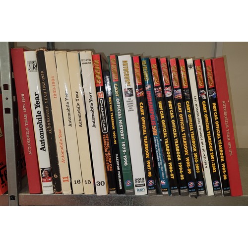 36 - A collection of motorsport books to include titles such as Official Yearbooks 2001-2003, Official Ye... 