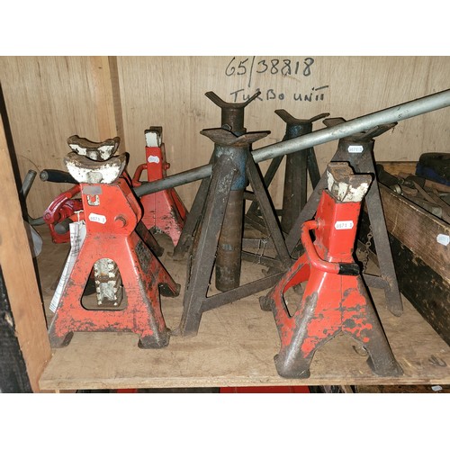 24 - 8 x axle stands, also an oil drum hand pump.