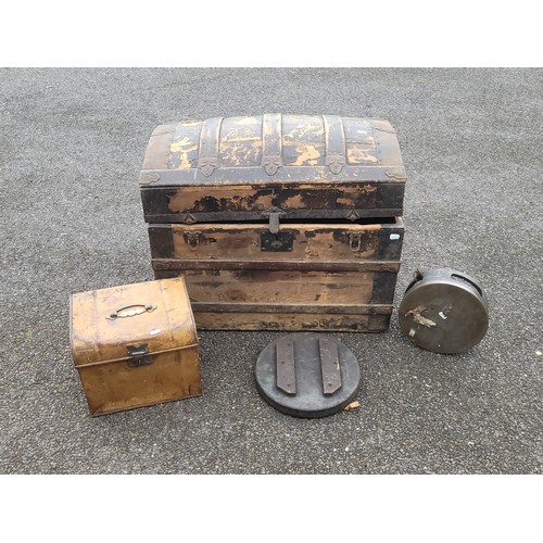 27 - One wooden dome chest, small metal dome tin, also two circular moulds.