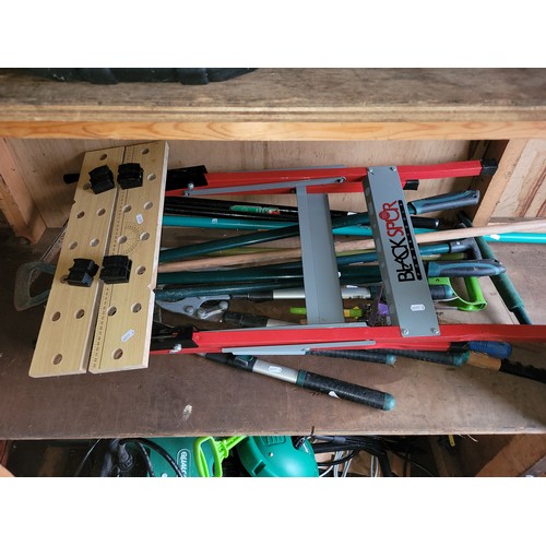 31 - Blackspur portable workbench, also a quantity of garden hand tools.