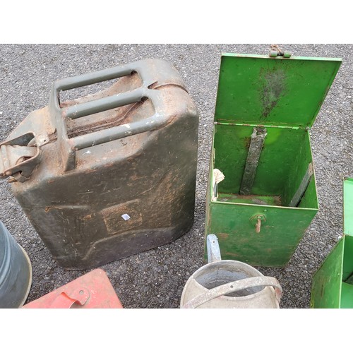 42 - 1 x jerry can, 1 x petrol can, 2 x metal storage cans and 2 x galvanised watering cans. (6)