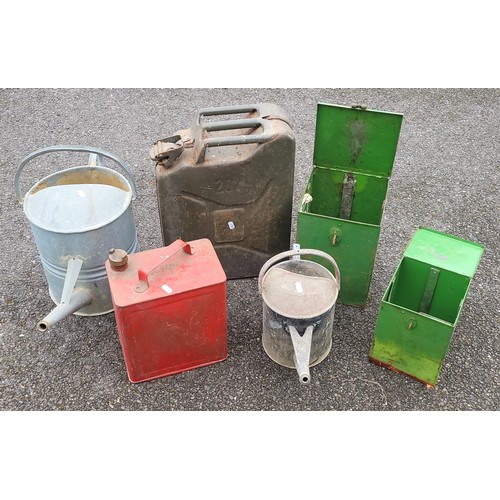 42 - 1 x jerry can, 1 x petrol can, 2 x metal storage cans and 2 x galvanised watering cans. (6)