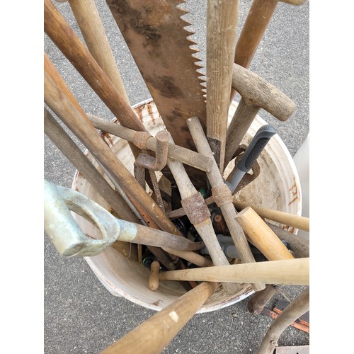 50 - 2 x large white tubs to contain a qty of garden hand tools to include spades, folks, brushes and rak... 