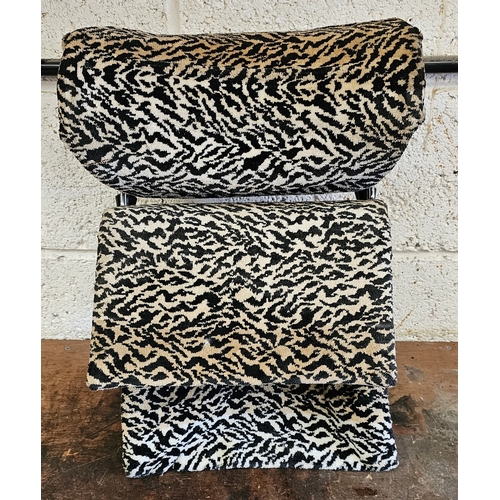 59 - A 1970/80's leopard print head rest