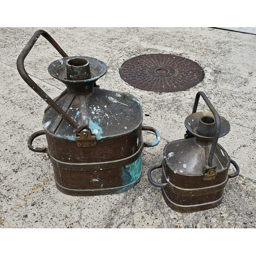 65 - Two Chekpump Imperial Standard brass and copper measuring jugs, one gallon and four gallon.