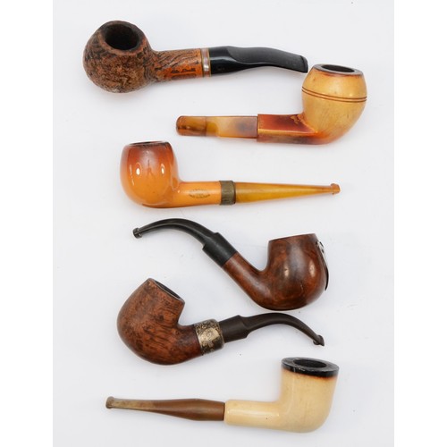 A collection of six 20th century smoking pipes, makers to include ...