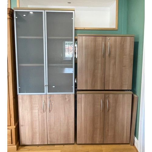 431 - A pair of modern teak effect office cabinets, having double cupboard doors opening to fitted shelf, ... 