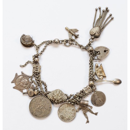 31 - A Victorian silver albertina bracelet with later charms, 44gm