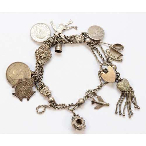 31 - A Victorian silver albertina bracelet with later charms, 44gm