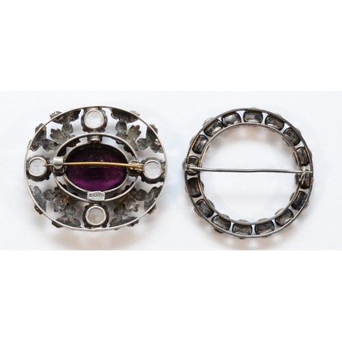 34 - An unmarked silver and multi-gemstone hoop brooch, 39mm and a silver and paste brooch, 25gm