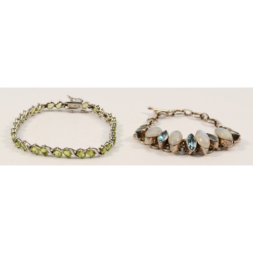 35 - A silver and peridot line bracelet , 21cm and a moonstone and blue stone bracelet, 40gm