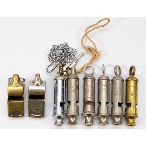 76 - A G.W.R. Thunderer whistle, another J.A.A.C. and six other whistles , including Boy Scouts