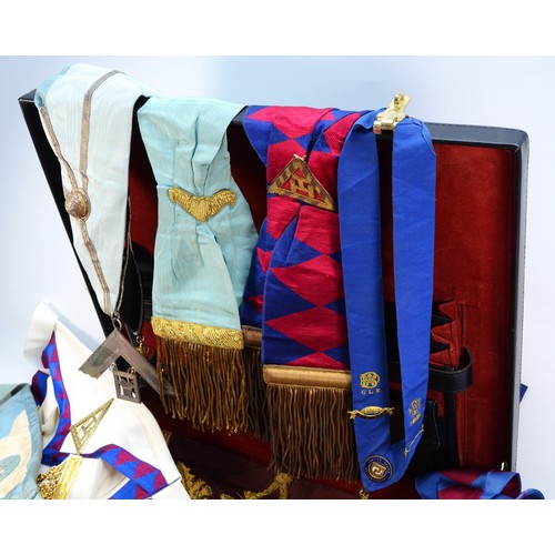 80 - A collection of various Masonic apron and collars