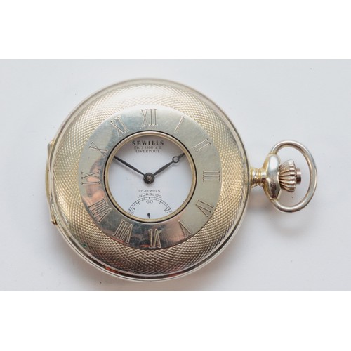 120 - Sewills, Liverpool, a modern silver keyless wind half hunter pocket watch, 48mm, working when catalo... 