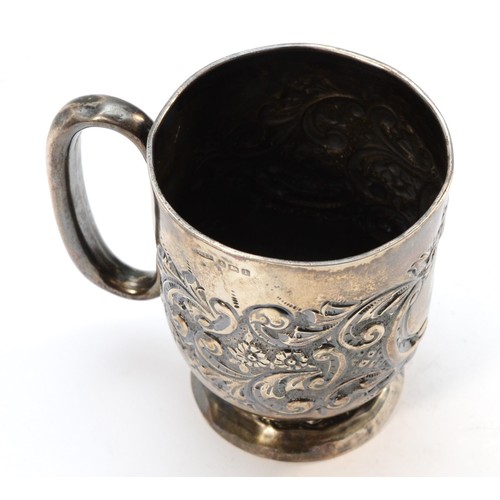 284 - An Edwardian silver christening mug, Birmingham 1910,  vacant cartouche, foot dented, 8cm, 90gm