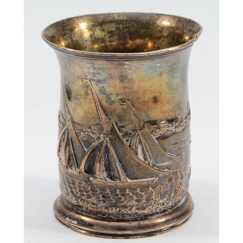 285 - A Victorian silver christening mug, London 1865, with embossed racing yacht and cattle decoration, e... 