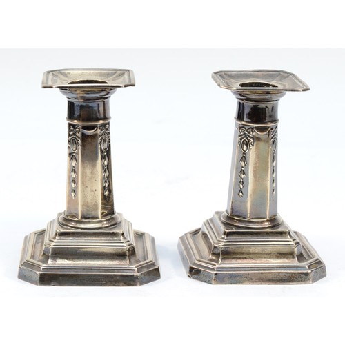 290 - A pair of silver desk candlesticks, Sheffield 1927, 10.5cm, loaded.