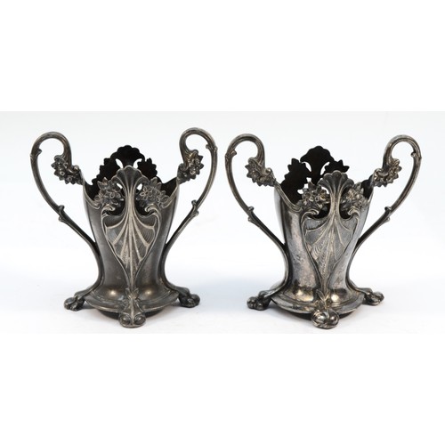 294 - WMF, a pair of pewter two handled glass vase holders, c.1905, stamped B, Beehive, I/O, OX, model 139... 