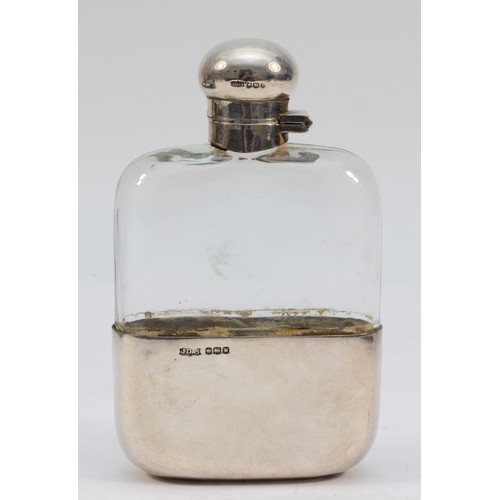 301 - A silver and glass hip flask, Sheffield 1964, with pull off cup and bayonet lid, 12.5cm