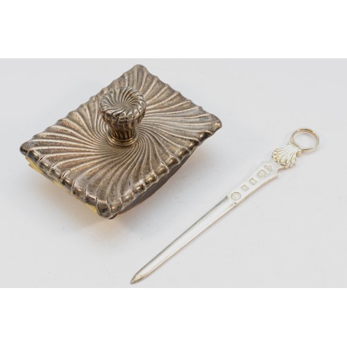 302 - A silver skewer letter opener, London 1953, Coronation mark, 16.5cm and a silver desk blotter, proba... 