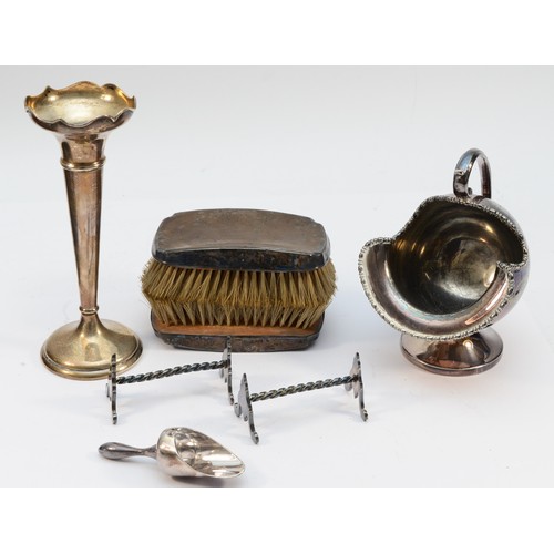 307 - A silver flower vase, Birmingham 1919, 18cm, loaded, a pair of silver mounted hair brushes, an EPBM ... 