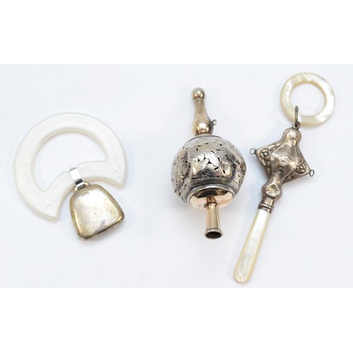 315 - A silver and mother of pearl rattle, Birmingham 1932, no bells, an Imman Sterling rattle and an unma... 