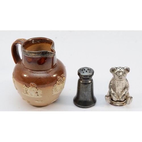 322 - A Victorian silver mounted stoneware jug, Chester 1890, 6.5cm a silver novelty Teddy Bear pepper pot... 