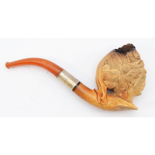 123 - An early 20th century cased meerschaum pipe of a female bust and flowers with white metal mount, 16c... 