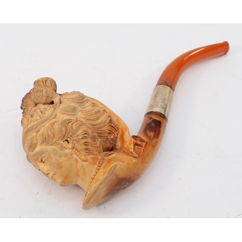 123 - An early 20th century cased meerschaum pipe of a female bust and flowers with white metal mount, 16c... 