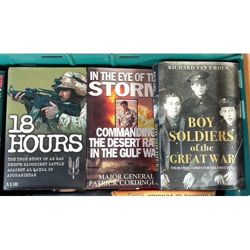 146 - A collection of military related hardback books in two boxes. (2)