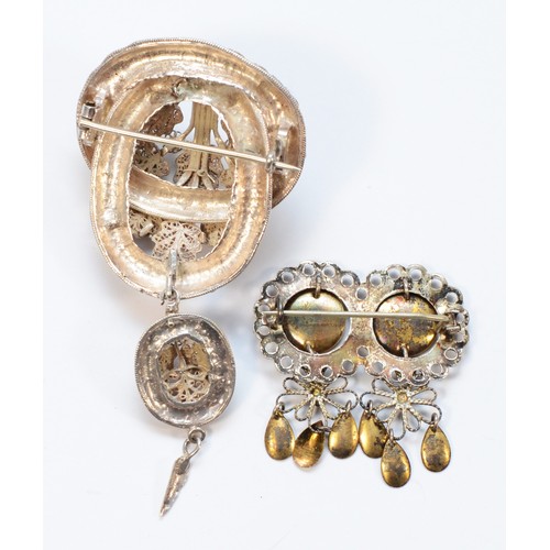 17 - A Victorian style silver filigree tassel brooch and another silver brooch, 26gm.