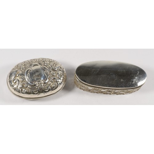 8 - A Victorian silver embossed soap holder, London 1900, 8 x 5.5 x 3.5cm, 73gm and a silver topped cut ... 