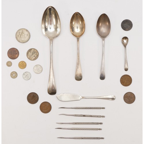 22 - A silver dessert spoon. Sheffield 1933, another spoon and butter knife, 108gm various coins and othe... 