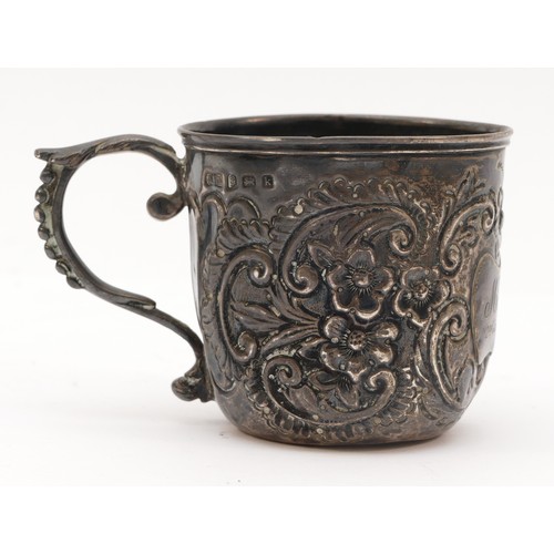 25 - An Edwardian silver christening mug, Birmingham 1909, with embossed decoration, 5.5cm, 49gm