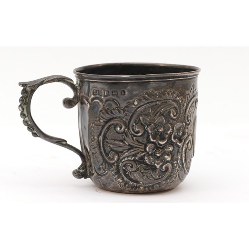 25 - An Edwardian silver christening mug, Birmingham 1909, with embossed decoration, 5.5cm, 49gm