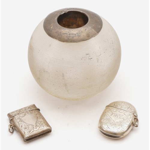 46 - A silver presentation glass match striker, Birmingham 1912, diameter 9cm and two silver vesta cases,... 