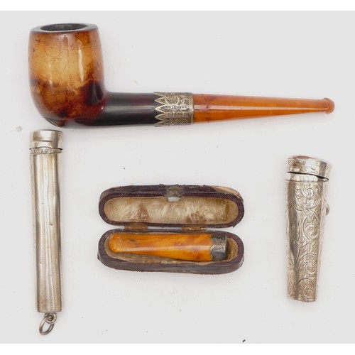 49 - An Edwardian silver mounted meerschaum pipe, Birmingham 1903, two silver cheroot holders and a chero... 