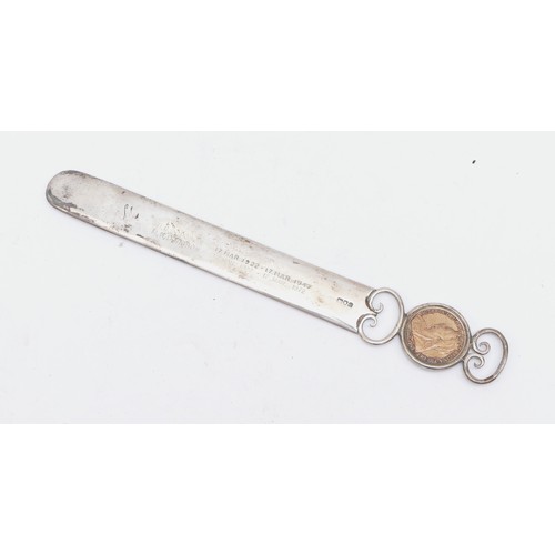 53 - A Victorian silver book mark, London 1900, inset with a 1901 penny, later inscribed, 25cm, 75gm