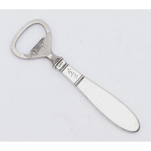 54 - A silver bottle opener, London import 1937, 12.5cm