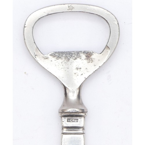 54 - A silver bottle opener, London import 1937, 12.5cm