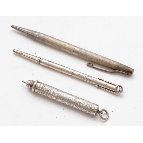 59 - A silver propelling pencil, inscribed Lady Vanity, a sterling silver Baker's Pointer Pencil and a a ... 